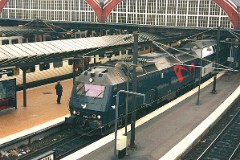 DSB ME 1533 in Copenhagen 27.November 2003.   The ME class was built by Henchel in Germany in a number of 37. It was put in service in 1981 - 1985. CO-CO. GM diesel engine 16. cyl. 3.300 hp. Max speed 175 km/h - 109 mph. Length 21 000 mm. Weight 115 metric tonnes. ME 1533 was put in service in 1985.